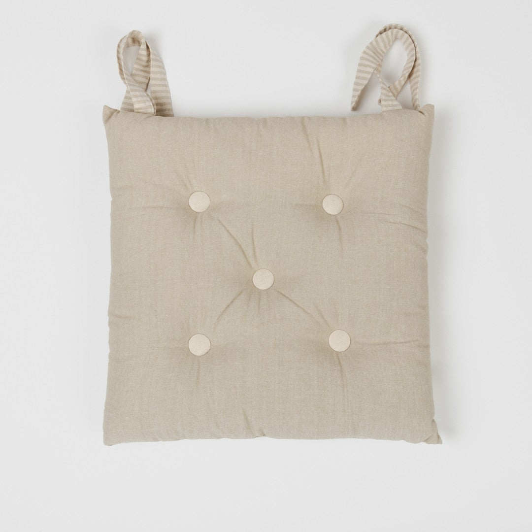 CUSCINO IN COTONE TINTA UNITA CON BOTTONI 0031