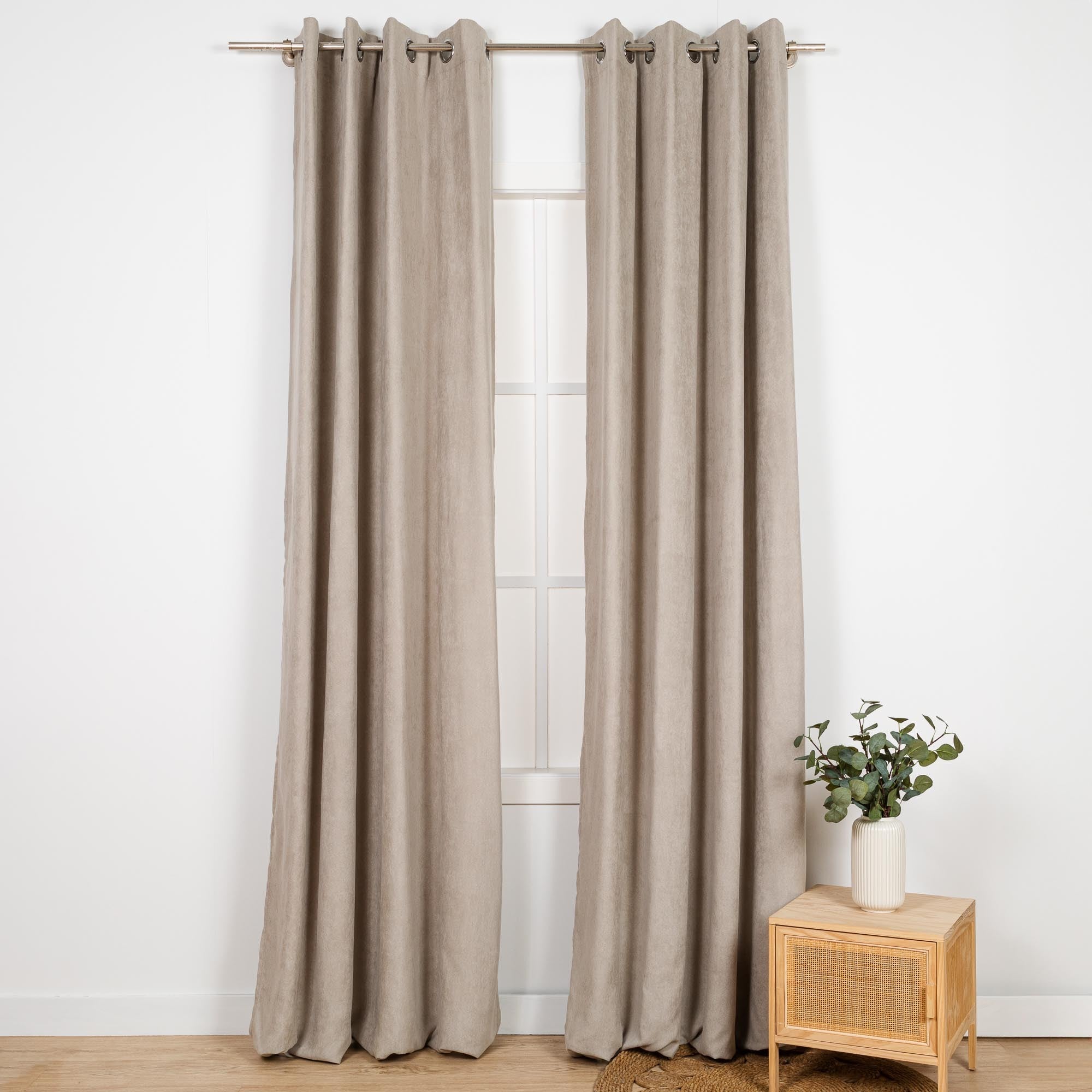 TENDA CON OCCHIELLI IN CAMOSCIO