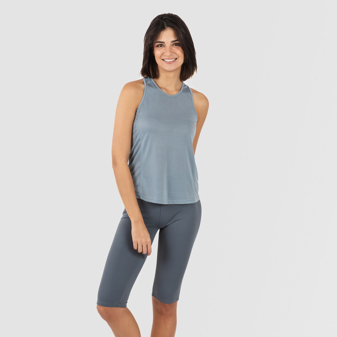Completo sportivo da donna con leggings corti e spalline