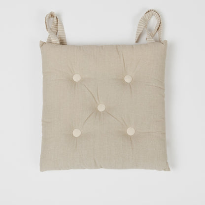 CUSCINO IN COTONE TINTA UNITA CON BOTTONI 0031