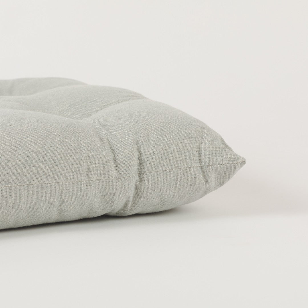 CUSCINO IN COTONE TINTA UNITA CON BOTTONI 0031